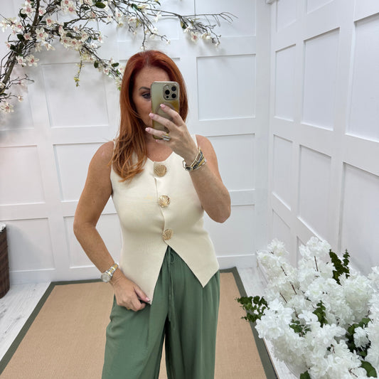 Laura: Cream fine knit gold shell waistcoat. 2 sizes