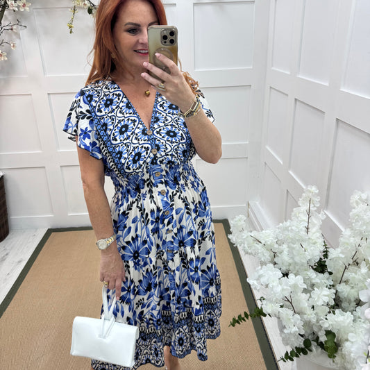Emmy: Blue & white floral stretchy V neck midi dress. One size: 10-20