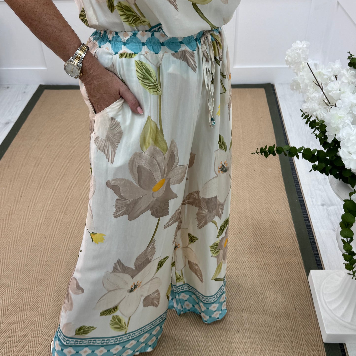 Bianca: Blue silky floral print wide leg trousers. One size: 10-16/18