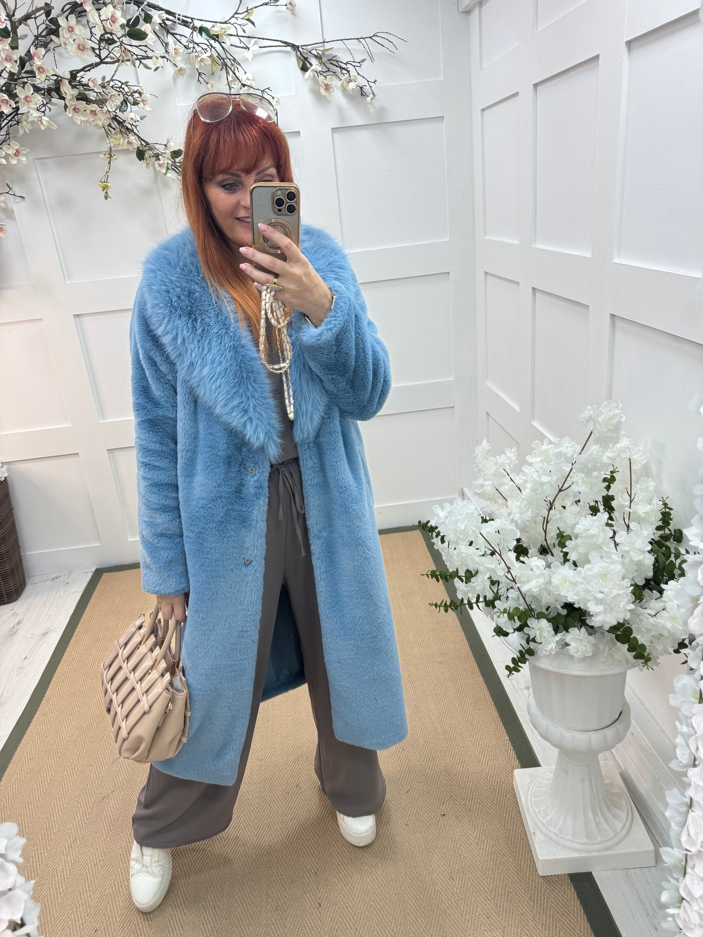 Madeleine: Blue long faux fur coat . One size 12-18