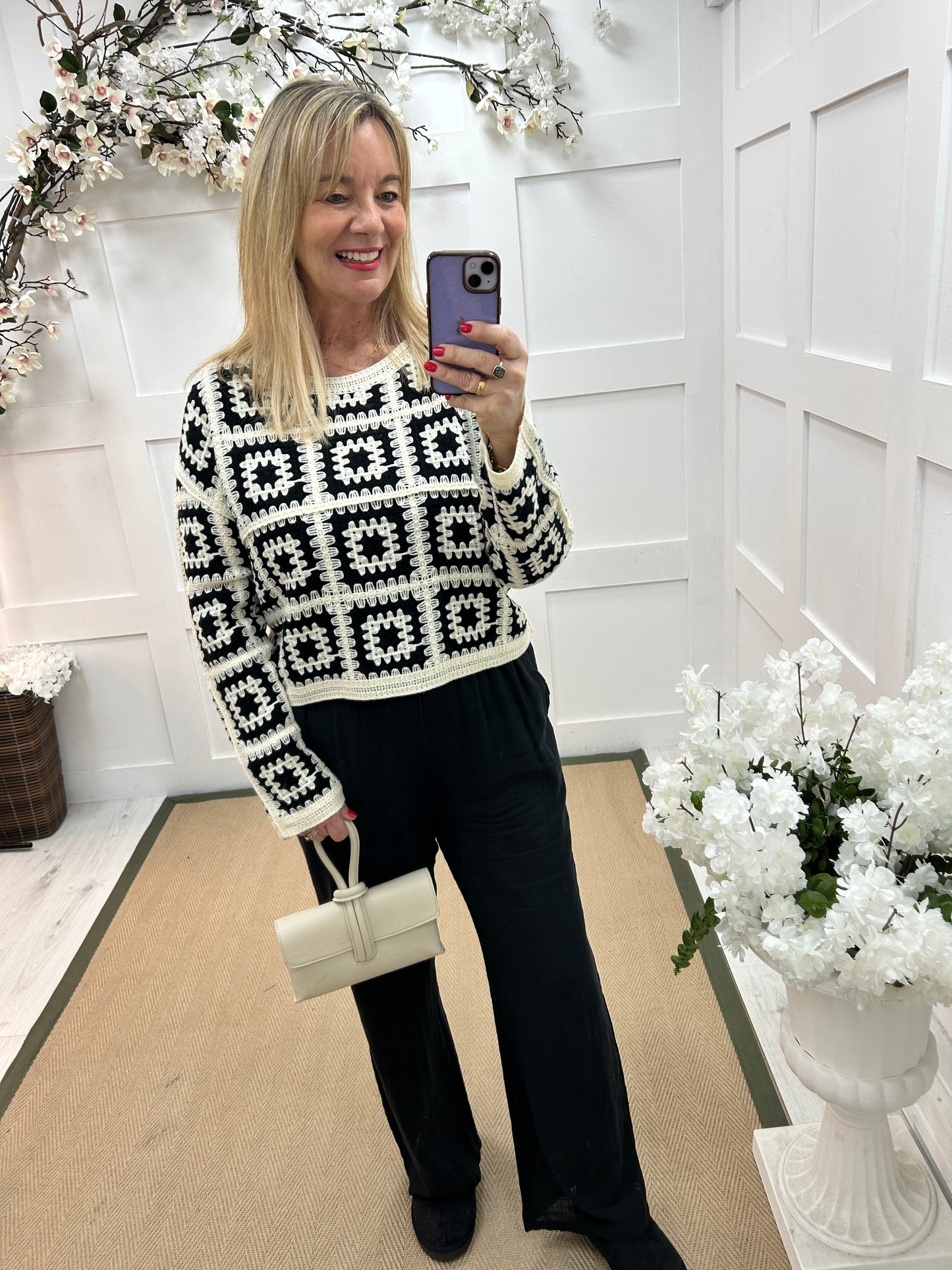 Carly: Black and cream long sleeve crochet top. One size: 14-18