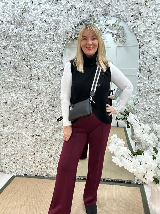 Carmen: Black sleeveless cowl neck wrap top. One Sz: 10- 16