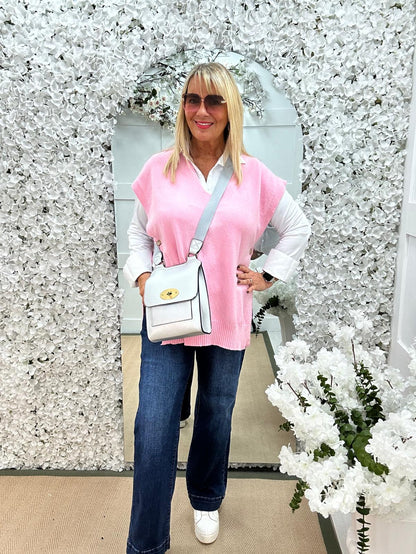 Phoenix: Pink button knit top. One size: 14-20