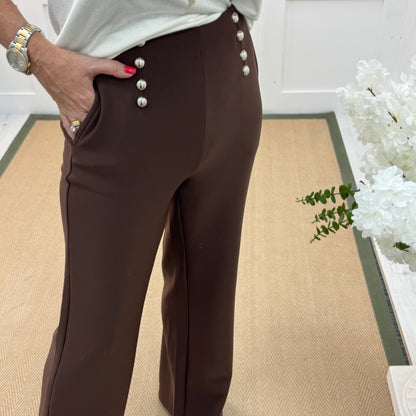 Paris: Brown stretchy silver button trousers. 4 sizes