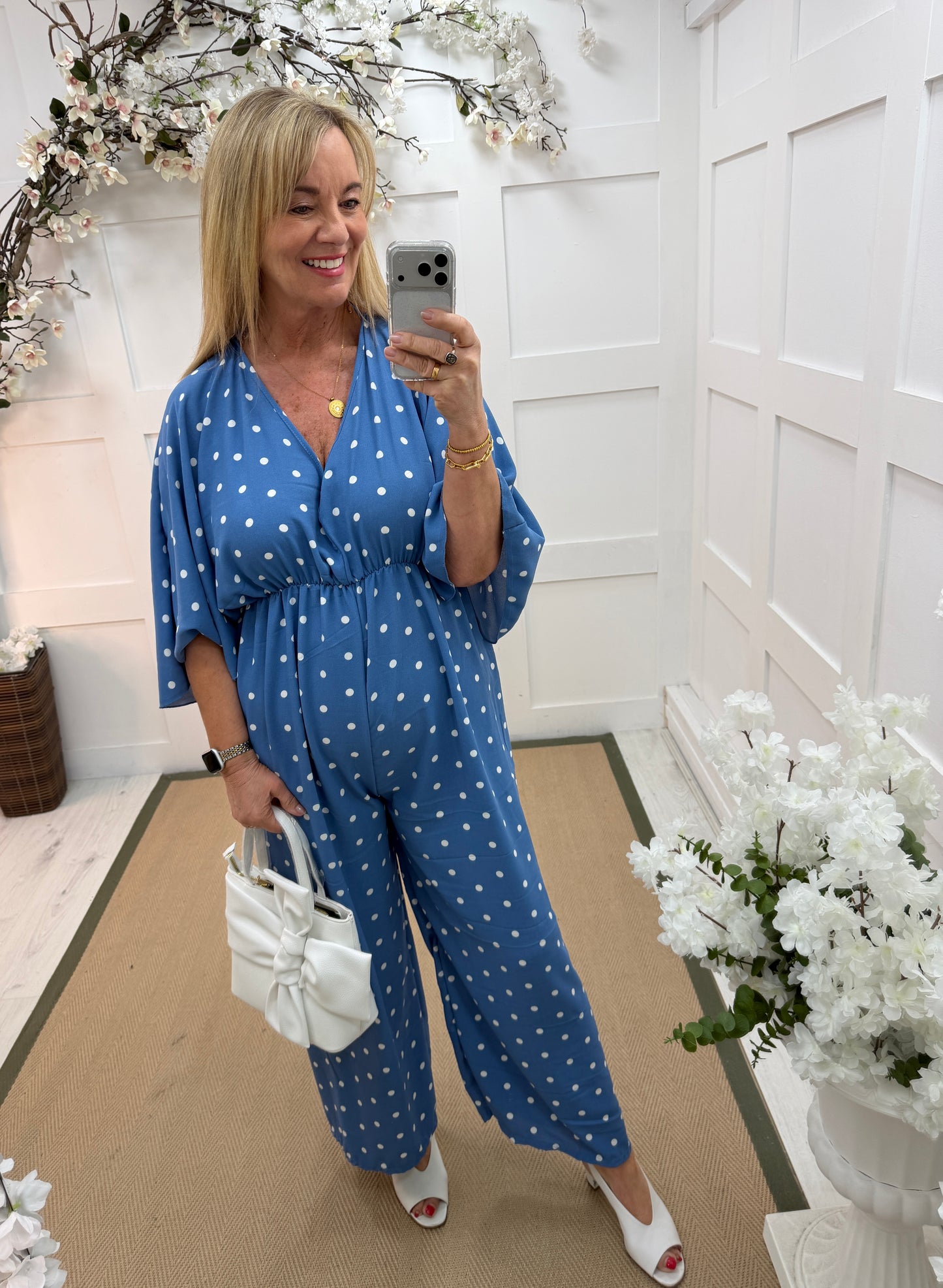 Amalia: Blue and white spotty wide leg jumpsuit. One size: 14-18