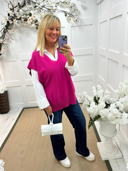 Phoenix: Hot pink button knit top. One size: 14-20