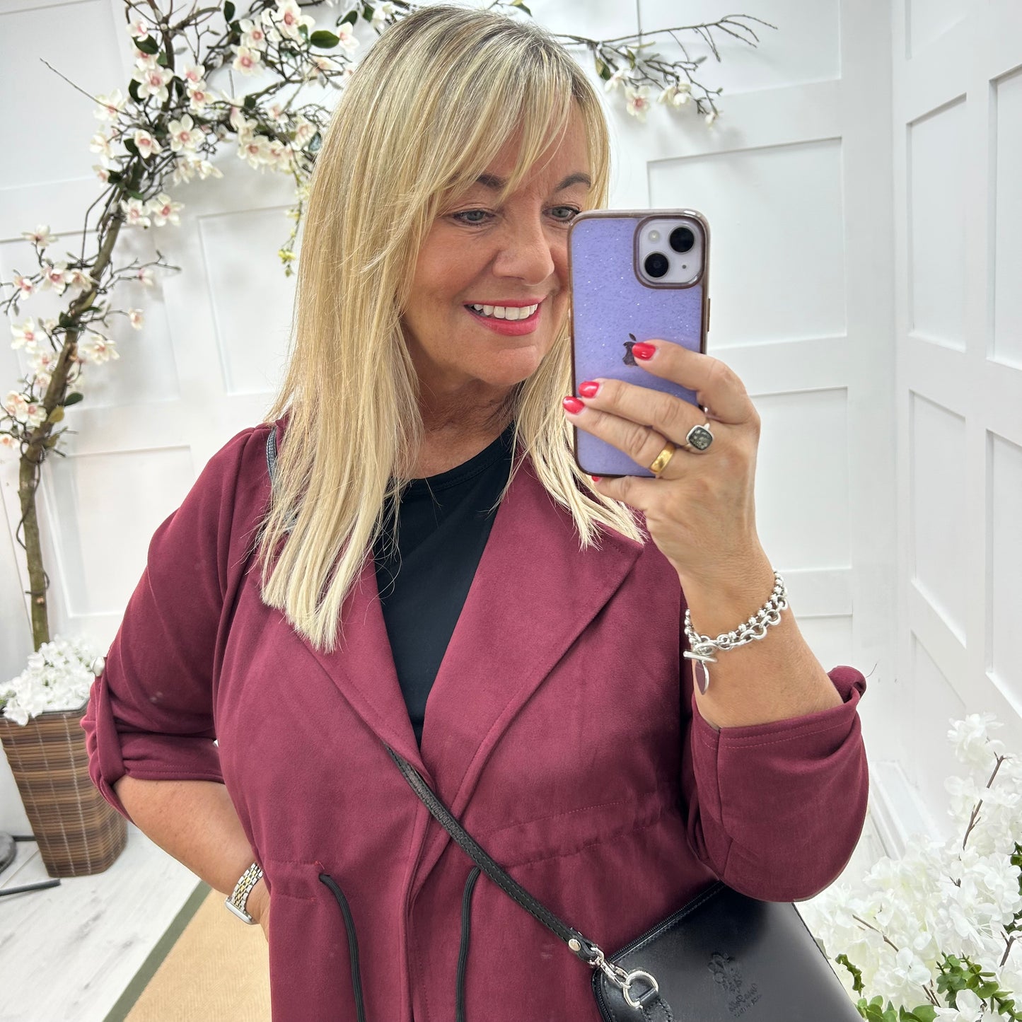 Marina: Burgundy long suedette trench coat. One size 12-18