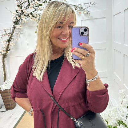 Marina: Burgundy long suedette trench coat. One size 12-18
