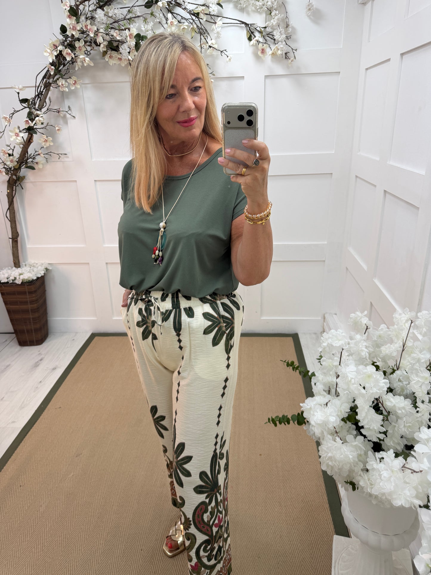 Nelly: Khaki short sleeved top with beaded necklace. One size 12-16