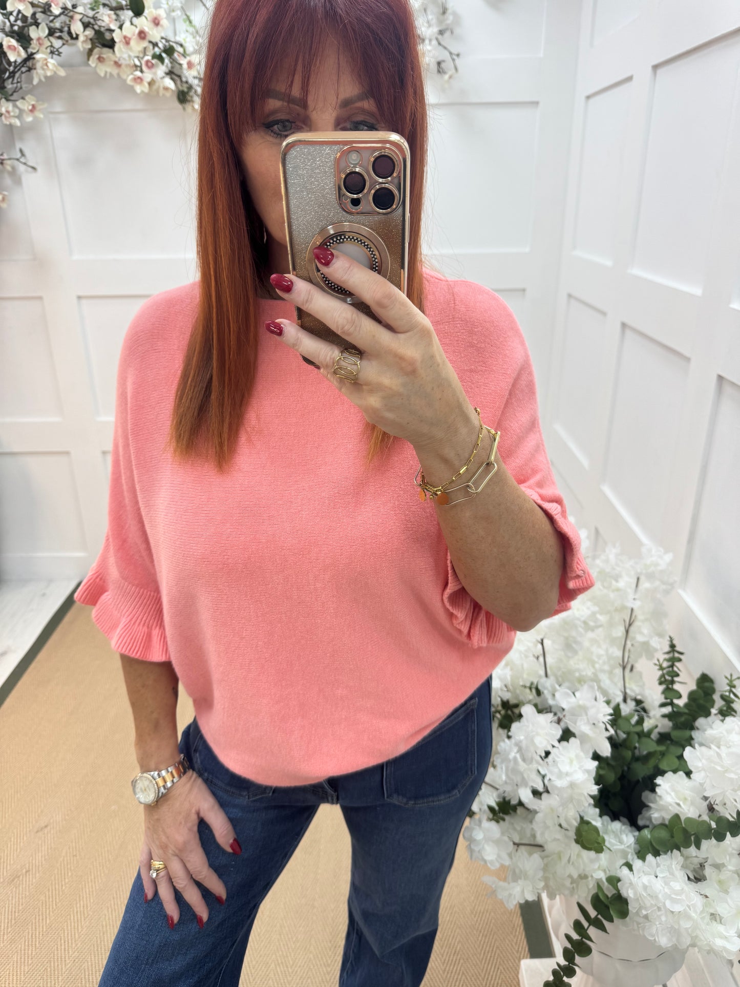 Sierra: Coral batwing fluted sleeve knitted top. One Size 12-18/20