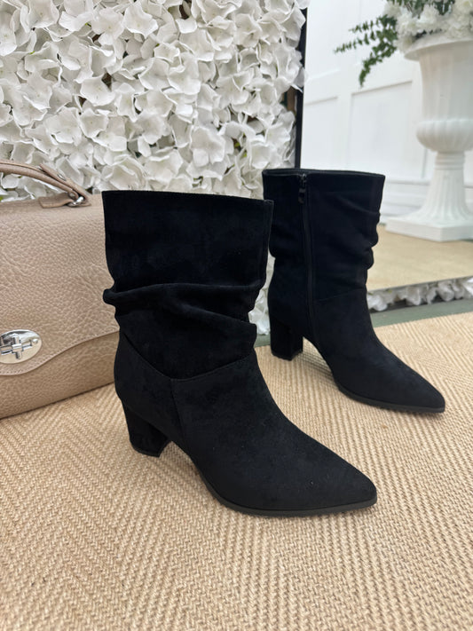 Gwen: Black slouch zip up short boots. Sizes: 3-8