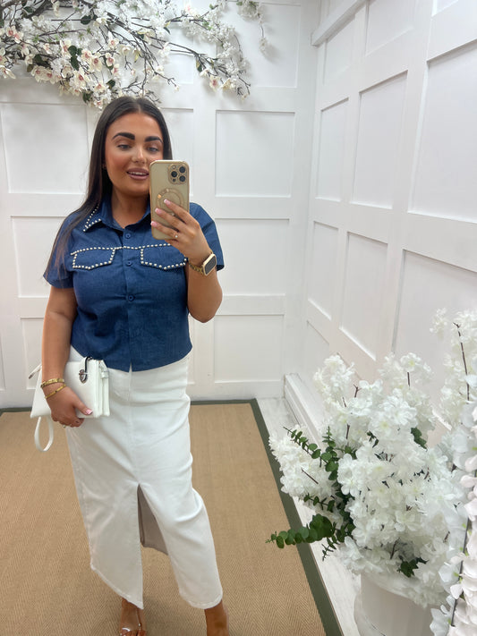Dolly: Blue short sleeve denim shirt with studs. 2 sizes.