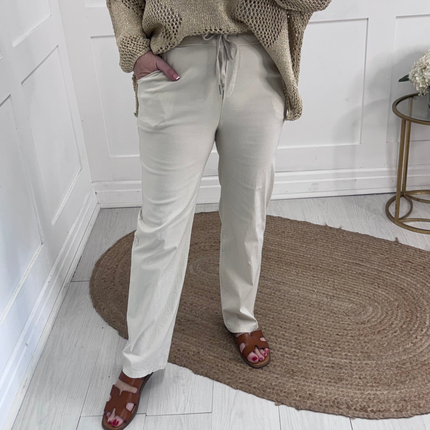 Maeva: Cream straight leg magic pants. One size: 10-14