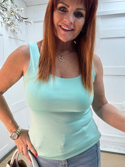 Abigail: Stretchy aqua basic vest top. 2 sizes