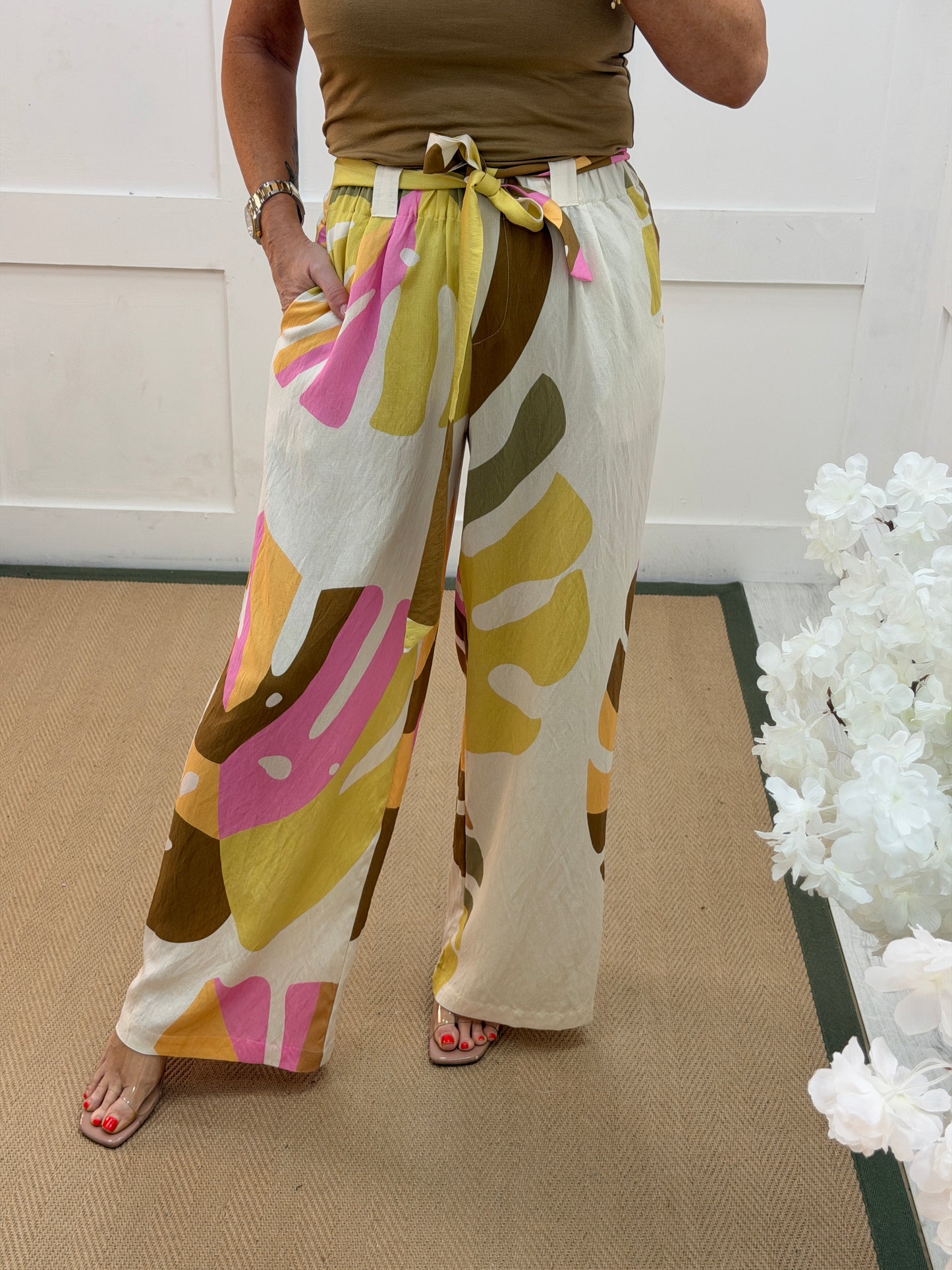 Bailey: Multicoloured abstract print belted trousers. 4 sizes.