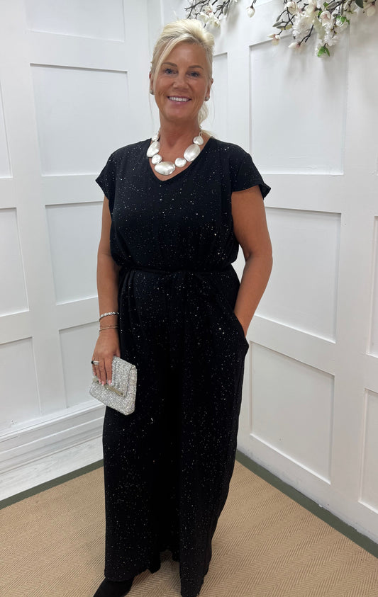 Gia: Black sparkle tie-waist wide leg jumpsuit. One size: 12-18
