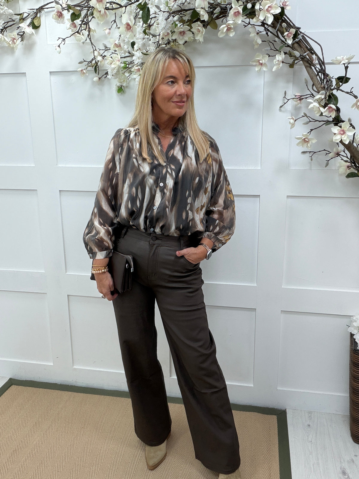 Brea: Brown animal print sheer blouse. One size: 12-18