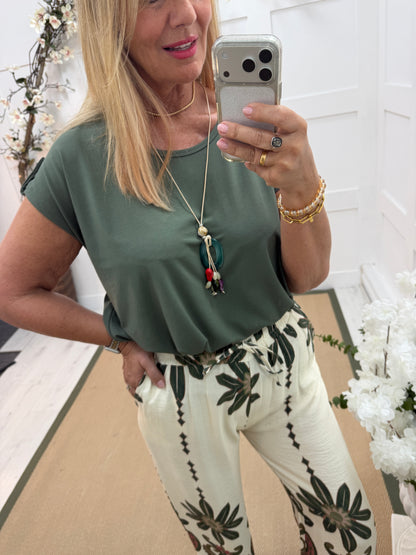 Nelly: Khaki short sleeved top with beaded necklace. One size 12-16
