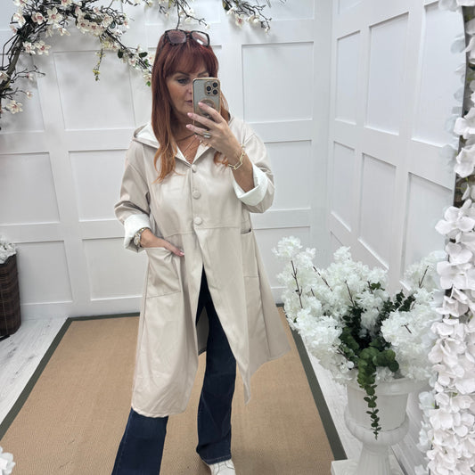 Alma: Cream long hooded raincoat. One size 12-18