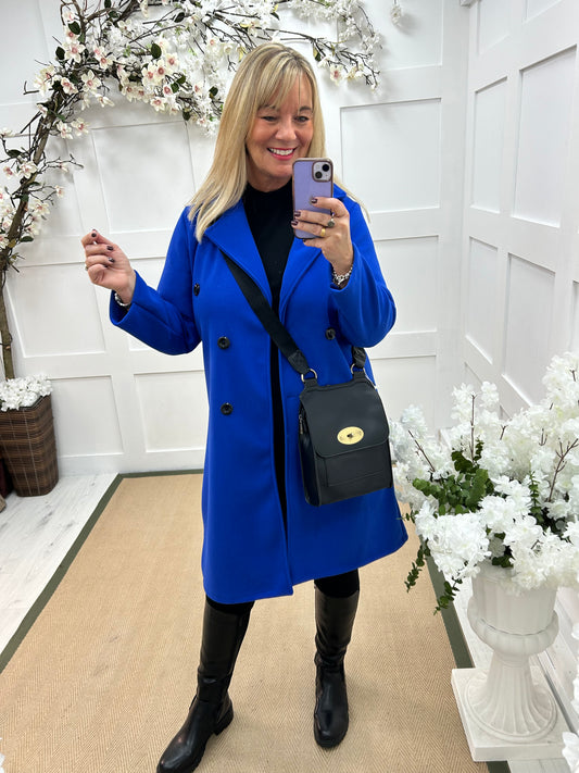 Camille: Blue trench coat . One size 10-16