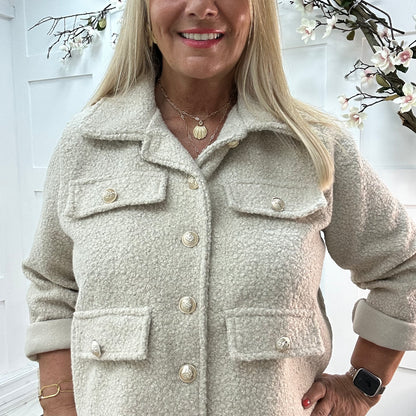 Bridget: Cream short boucle button jacket. One: 12-20