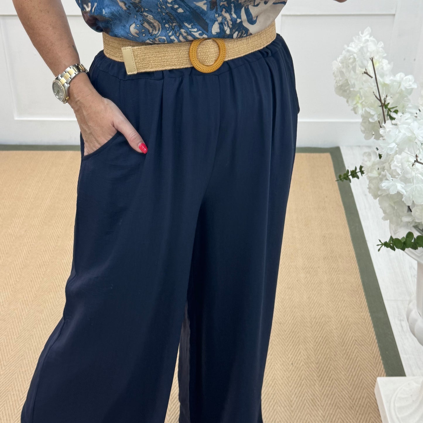 Tiggy: Navy wide leg belted trousers. One size: 10-16