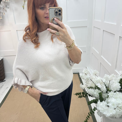 Sierra: Cream batwing fluted sleeve knitted top. One Size 12-18/20