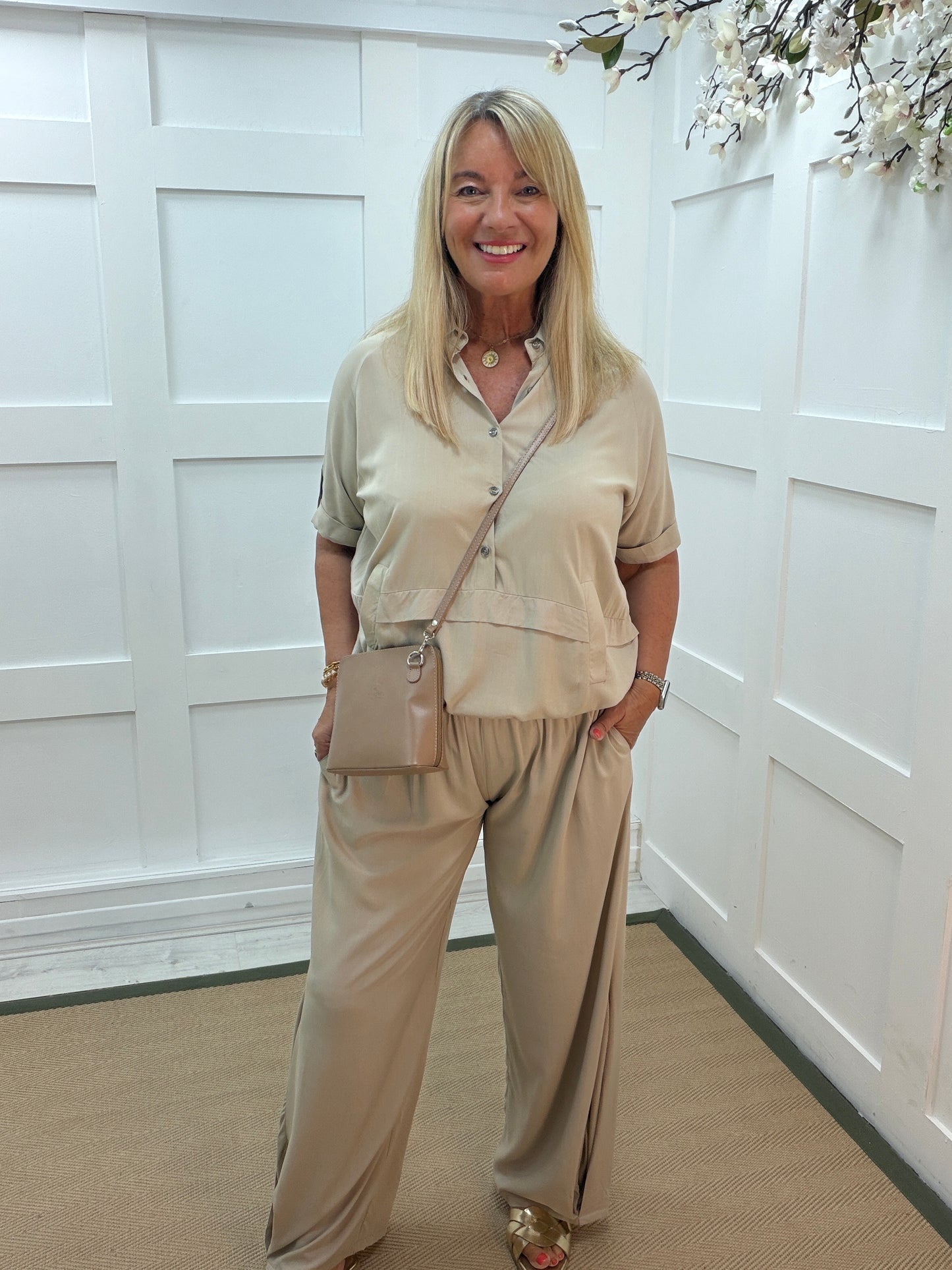 Sloane: 3/4 sleeve buttoned front elasticated waist top. One size: 14-20. 3 colours