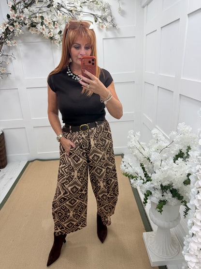 Florrie: Printed needlecord barrel leg belted trousers. One size: 10-18. 3 colours