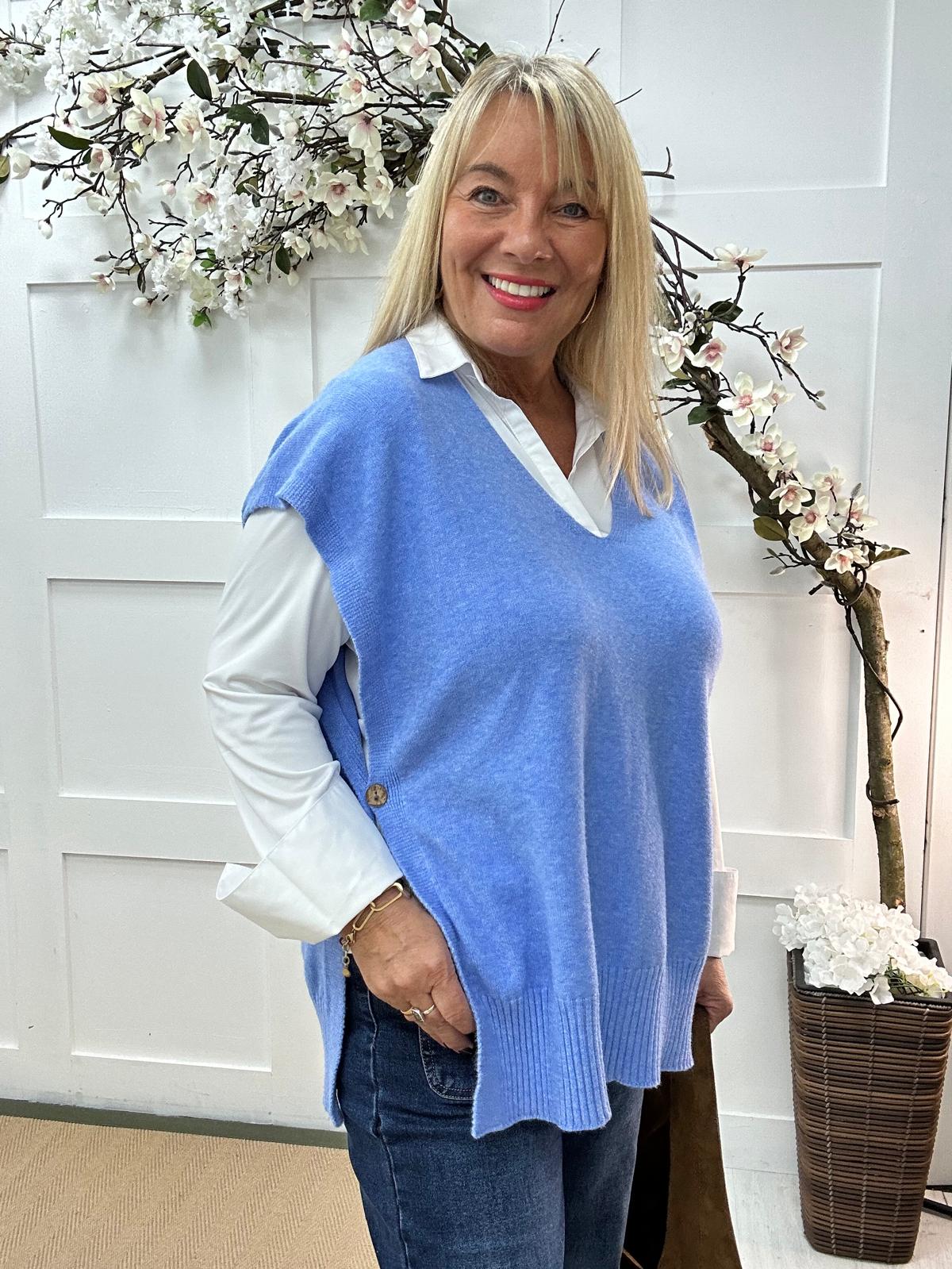 Phoenix: Blue button knit top. One size: 14-20