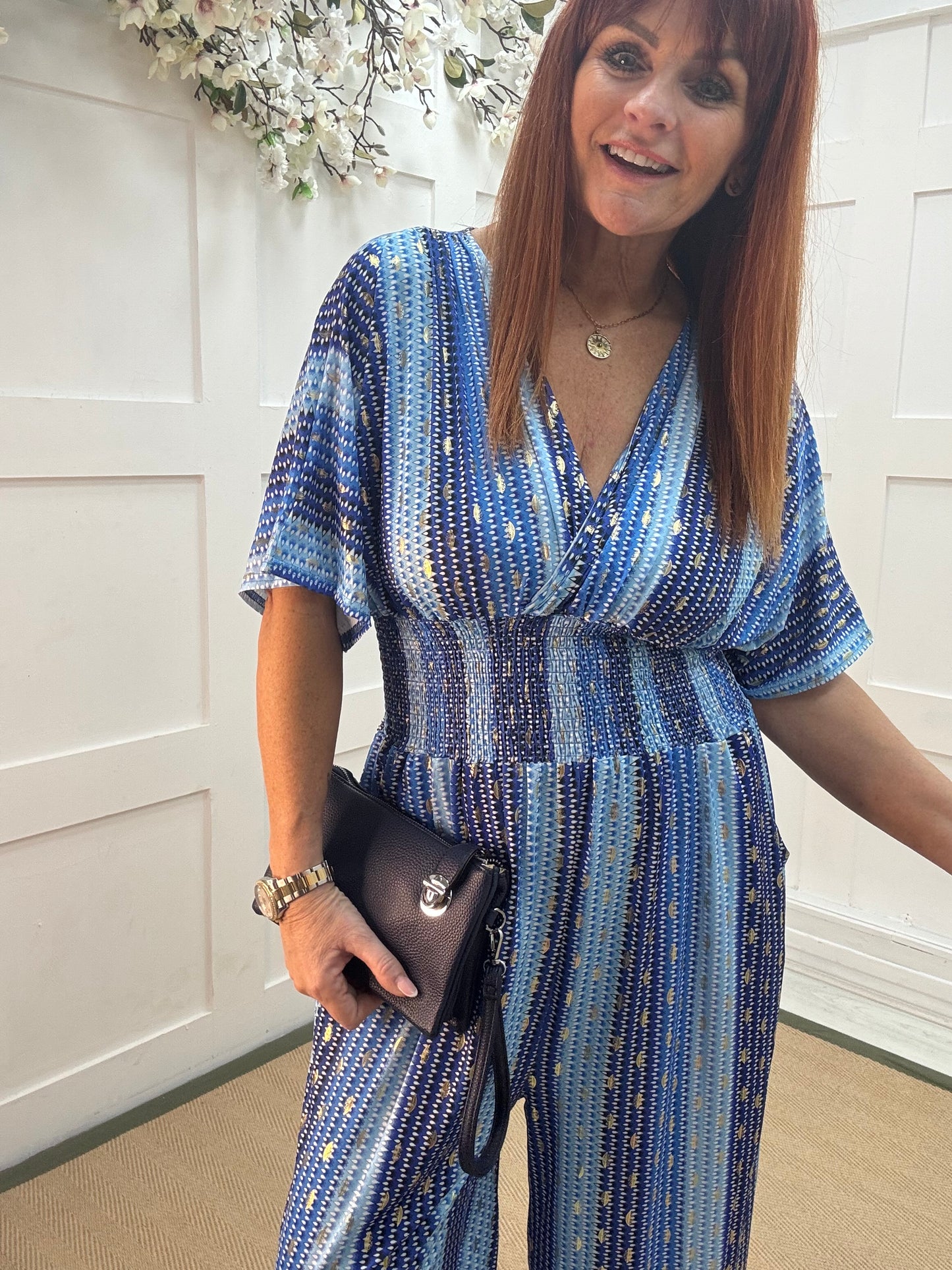 Gia: Blue and gold speckle wide leg jumpsuit. One size: 12-18