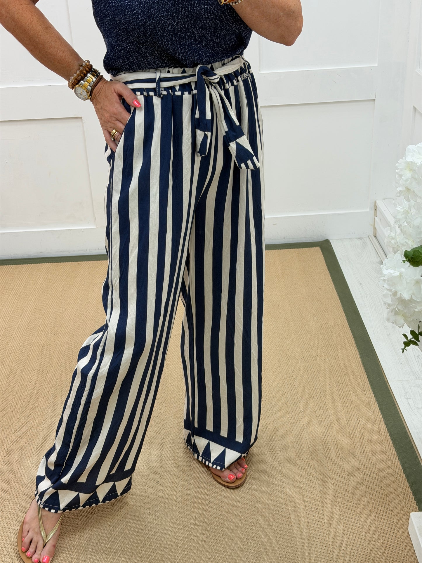 Aven: Navy stripe wide leg trousers. One size: 10-16
