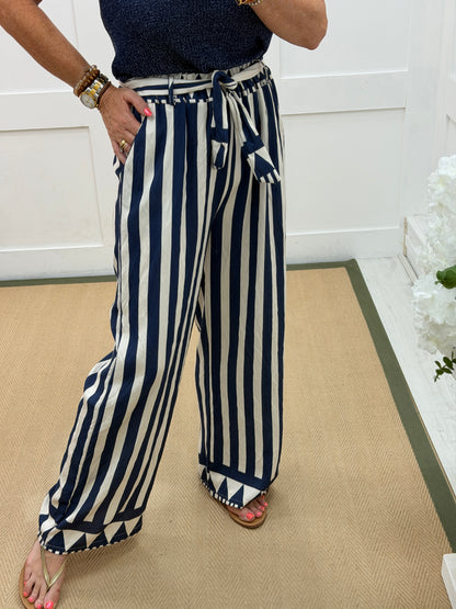 Aven: Navy stripe wide leg trousers. One size: 10-16