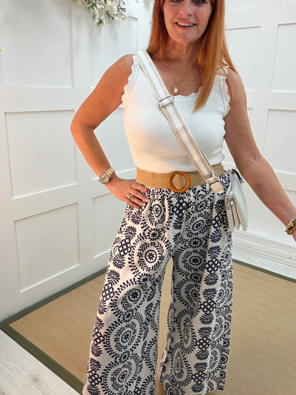 Florrie: Floral wide leg belted trousers. One size: 10-16. 2 colours