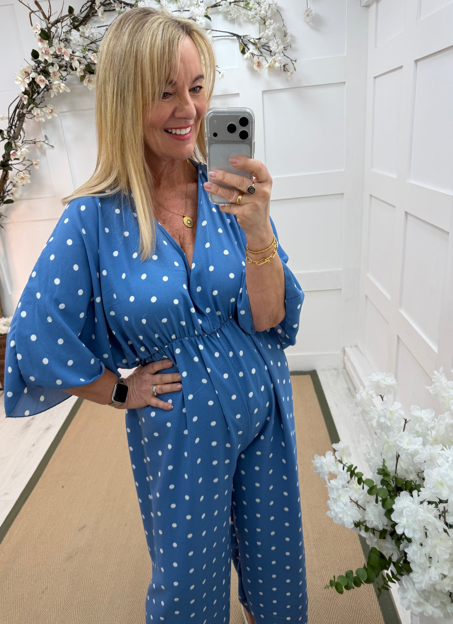 Amalia: Blue and white spotty wide leg jumpsuit. One size: 14-18