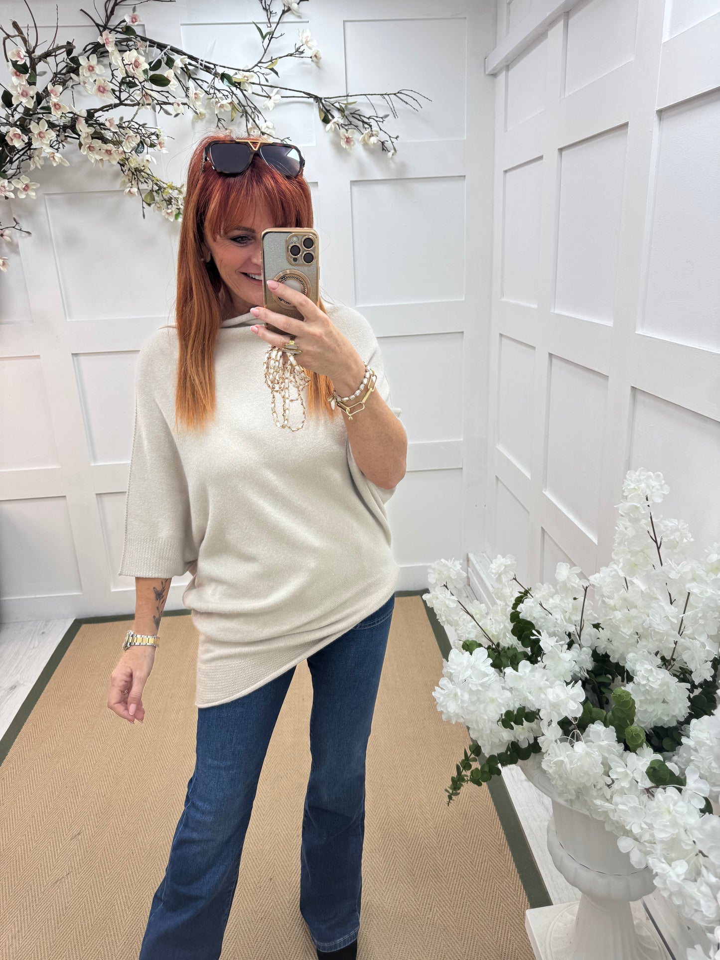 Samantha: Oatmeal asymmetrical slouch top. One size 10-18