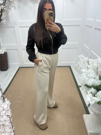 Trudy (Short): Cream stretchy wide leg pocket trousers. One size 10-16