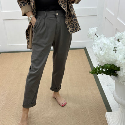 Mandi: Brown stretchy frill pocket magic trousers with rear pockets. One Size: 14-20