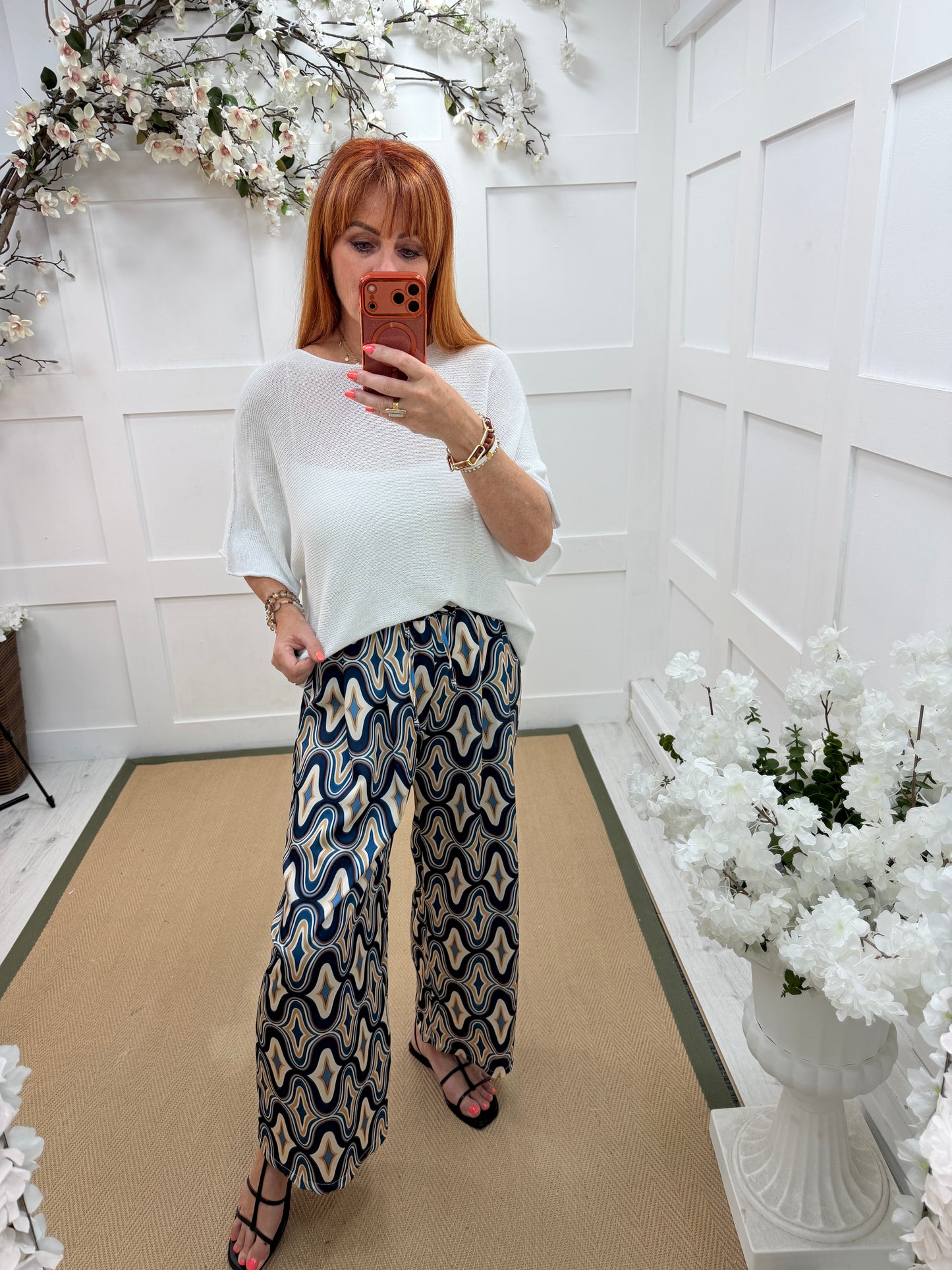Binnie: Blue wide leg patterned trousers. One size: 10-14
