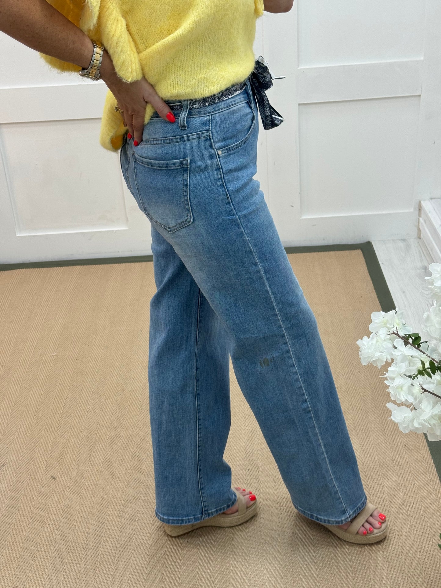 Jess: Washed denim high waist wide leg jeans. Sizes: 8-18