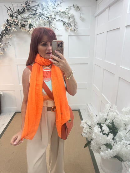 Tula: Neon orange long frayed raw edge scarf. One size