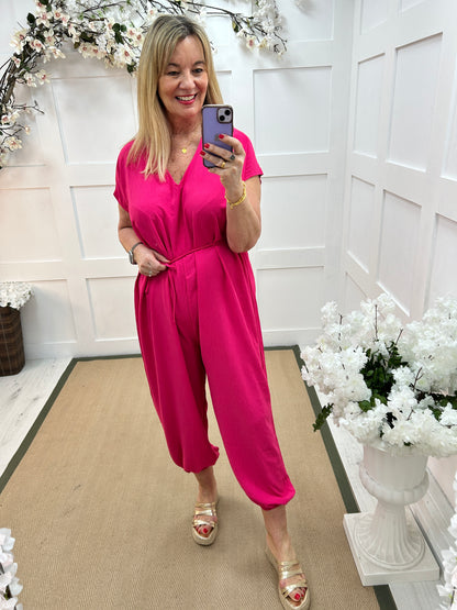Lily: Hot pink plus Size V-neck jumpsuit. One Size 16-20