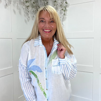 Stacie: Blue palm tree & script diamanté shirt. One size: 14-20
