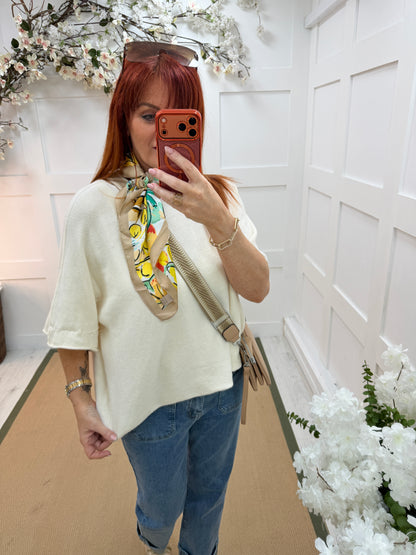 Carrie: Cream short knitted top. One size: 12-18/20