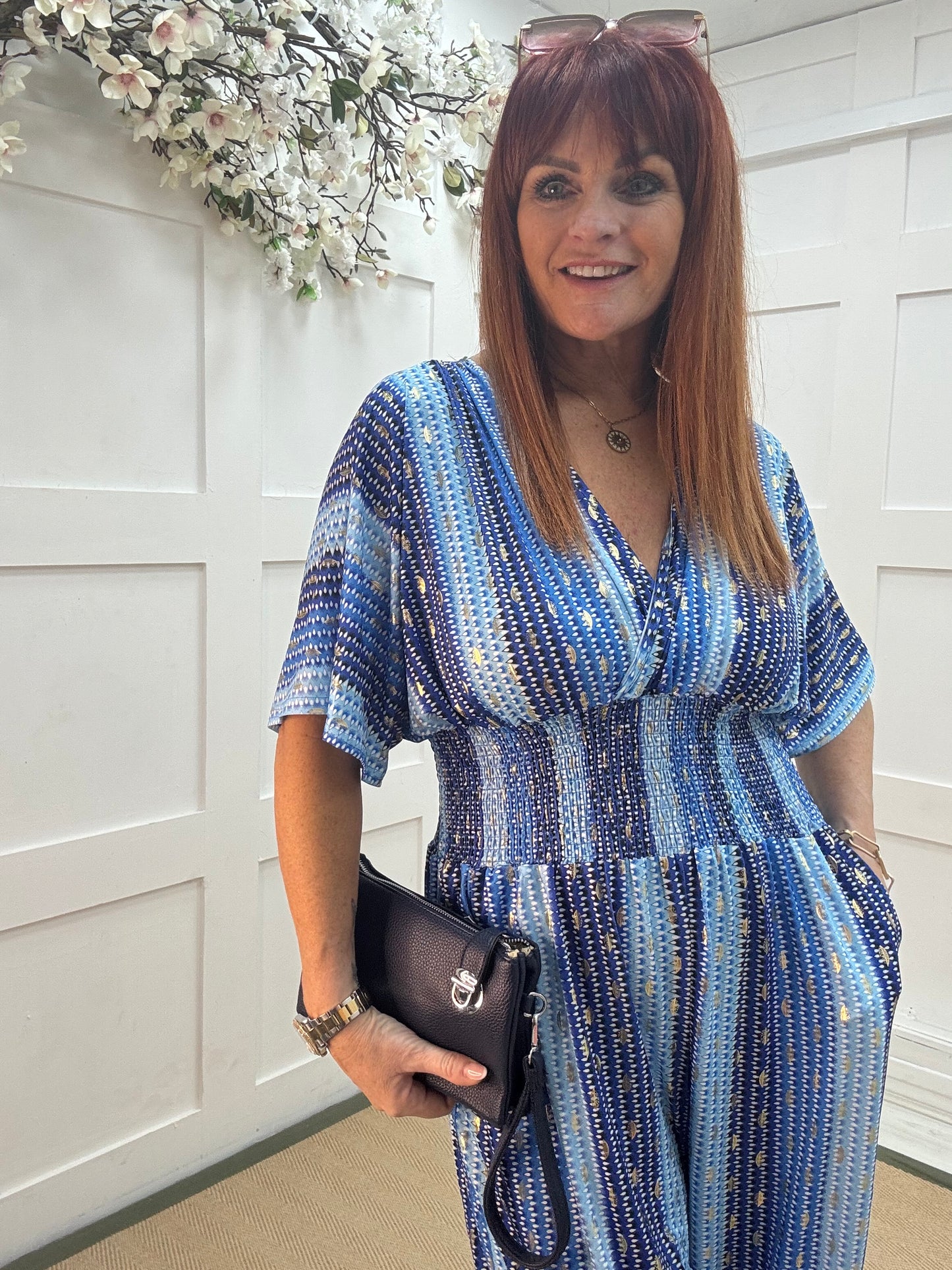 Gia: Blue and gold speckle wide leg jumpsuit. One size: 12-18