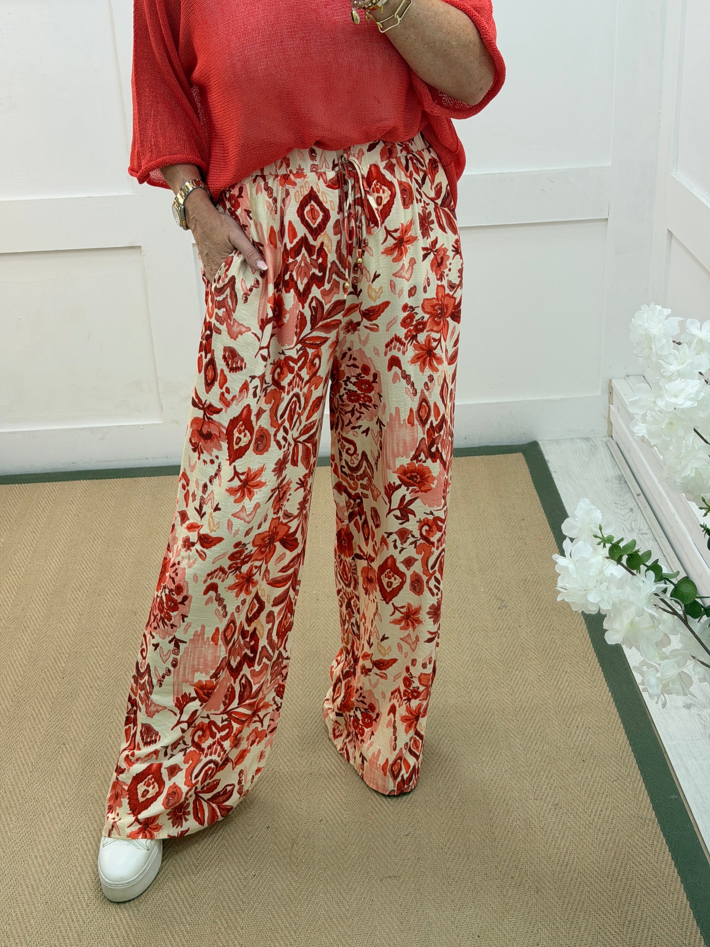 Ruby: Coral floral print wide leg trousers. 4 sizes