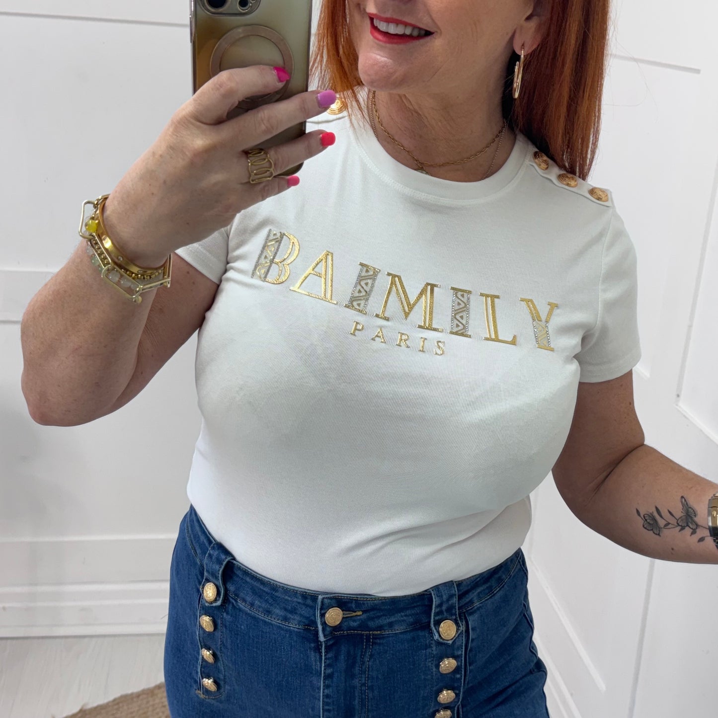 Briana: White gold script logo T shirt. 2 sizes