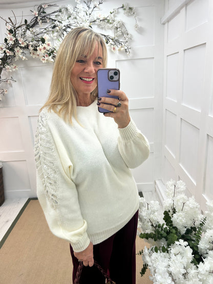 Crystal: White sequin embellished knit top. One size: 14-20