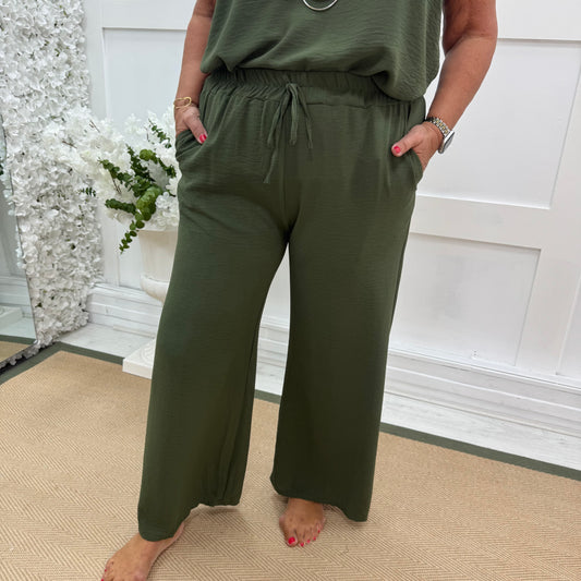 Esme: Khaki pocket wide leg trousers. One size: 12-20