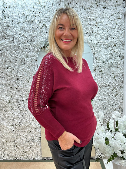 Arianne: Burgundy sparkle cutout shoulder top. One size: 12-16